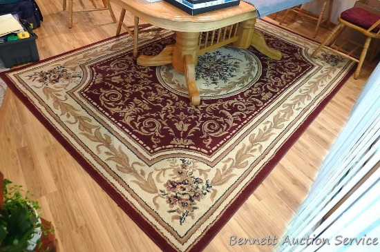 78" x 114" floor rug in good condition. Some small spots. No fraying noted.