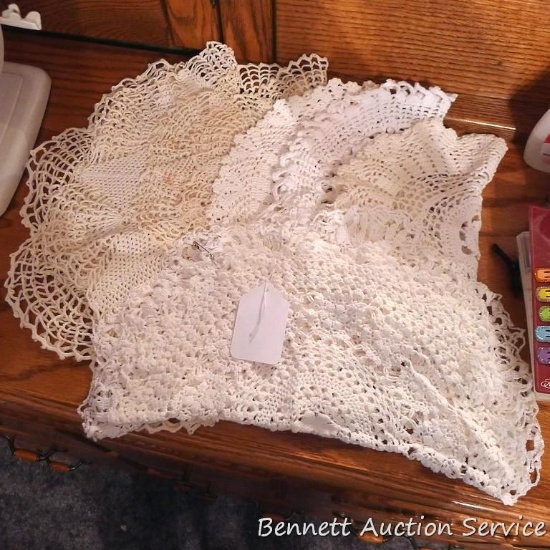 Variety of crocheted doilies up to 16" diameter.