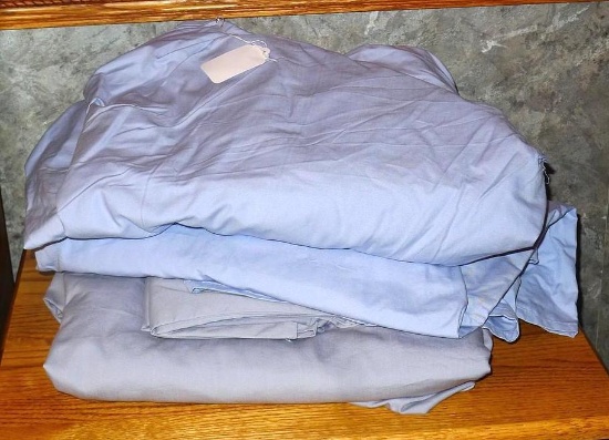 Two king sized sets of sheets, one set has pillow cases. These two sets have deep sides.