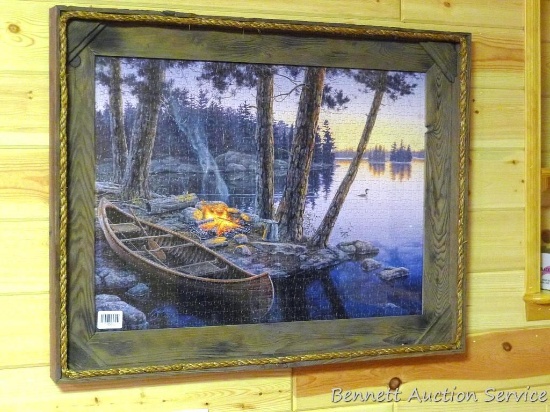Barn board frame measures 22" x 35 and displays a camping scene jigsaw puzzle.