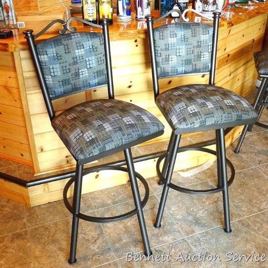 Pair of sturdy steel framed swiveling bar, bistro or coffee shop stools. Stand 45" to top of back,