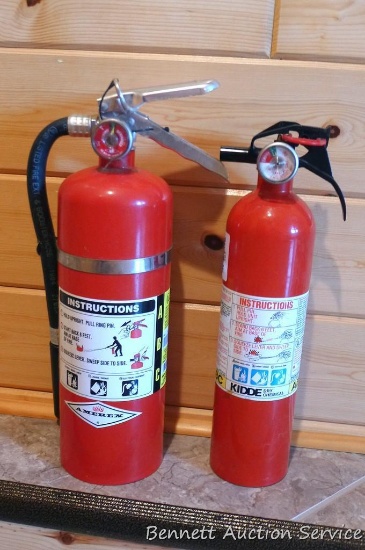 Kidde ABC fire extinguisher, gauge indicates good.