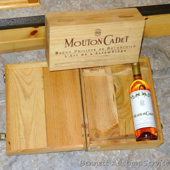 No shipping. One bottle of 2001 Mounton Cadet Bordeaux; plus two wooden wine boxes. All unopened,
