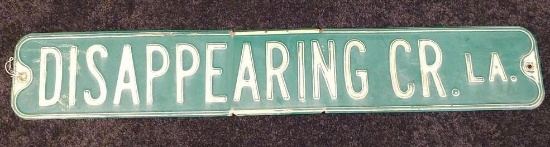 Decommissioned stamped steel road sign from Disappearing Creek Lane, 3' wide.
