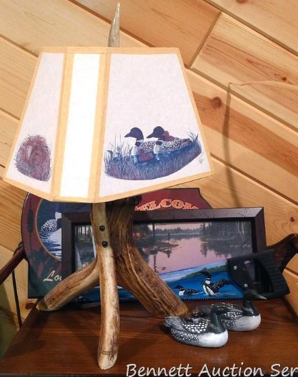 Framed loon print, plus other loon pieces. Frame is 16" wide. Lamp stands approx. 20" tall.