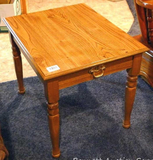 End table with hardwood legs measures 20" high x 23" deep x 19" deep.