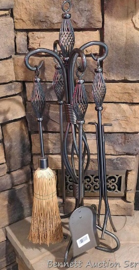 The nicest fireplace set I've ever seen stands nearly 3' tall and appears unused.