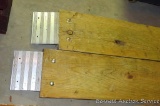 Heavy duty treated 2x10 load ramps are about 8' long.