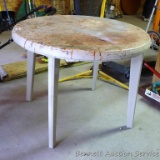 Weatherproof table is over 3' across.