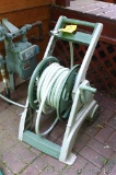 Ames hose reel with hose.