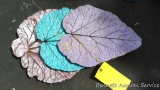 Three concrete leaf decorations are in good condition. Largest is approx 19