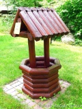 Wishing well garden piece would look great with a basket of flowers in the center. Stands 4-1/2'