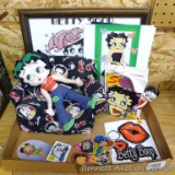 Betty Boop collectibles including ceramic bank, magnet, framed piece, more.