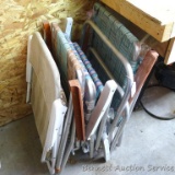 Four aluminum framed lawn chairs, plus one other. Webbing is worn.