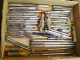 Various sizes of reamers, largest is 7