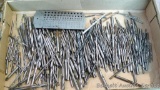 Metal drill bits; metal twist drill and machine screw tap gauge.