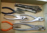 Hand pliers; vise grips; needle nose pliers. Longest is 10