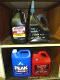Automotive Peak antifreeze & coolant; partial container of Marvel Mystery oil; partial container of