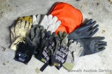 Assortment of used gloves includes leather and more.