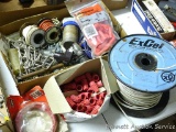 Box of electrical goodies including red wire nuts, wire and more.