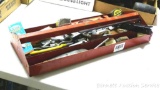 Metal tool box tray filled with tape measures; wrenches and more.