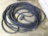 Heavy duty extension cord, owner states it is about 75' long.