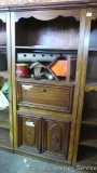 Nice sturdy bookshelf unit has bottom storage and stands approx. 6-1/2' tall x 32