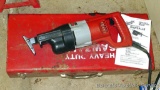 Milwaukee Sawzall comes with metal box. Seller states that it is almost new, could have a broken