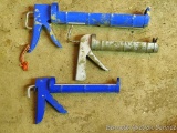 Pair of caulking guns for standard tubes; one gun for large tubes.