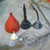 Plastic funnels, largest is 9