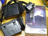 Two wild game scouting camera external battery packs. Includes chargers and carrying case.