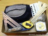 Pair of knee pads; carpenter's square; tape measure and more.