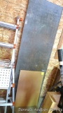 This piece of galvanized covered wood would make a great potting bench, workbench, or other.