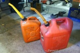 Blitz 5 gallon gas tote; 2-1/2 gallon gas tote with partial fluid in. No shipping.