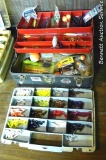 Metal 2 tray tackle box filled with lures, bobbers, hooks and more; Plastic lure caddy filled with