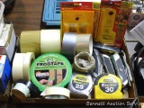 Tape in various sizes and types; Stanley 25' tape measure; Stanley 30' tape measure; utility knives.