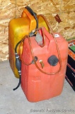 Two 6 gallon boat gas cans.
