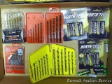 Metal drill bits; AAA, AA rechargeable solar landscape batteries, appear NIP.