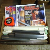 Popular Mechanics and Popular Science magazines; drawer guides; Lufkin 25' self centering tape