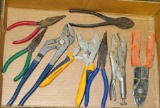 Assortment of pliers includes needle nose, side cutters, adjustable pliers and more.