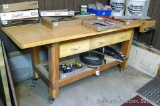 Nice woodworking bench on rollers 80