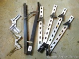 Corner clamps for picture framing. One is Pony brand.