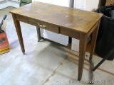 Wooden table with center drawer 42