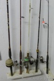 Five fishing rods 4 with reels, tallest is 80
