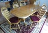 Very nice oak dining table and chairs. 60