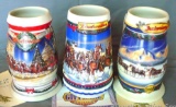 2000, 2001, 2002 Budweiser beer steins, tallest is 7