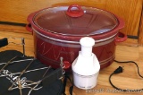Six quart Crock Pot with accessories including rack, tote; food chopper. In very good condition.