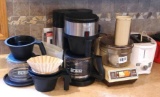 Bunn coffee maker with extra pot, basket, filters, etc.; GE food processor; two slice toaster.