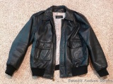 North Crest genuine leather jacket size men's medium. Lining is 100% polyester.