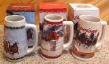 2009-2011 Budweiser Holiday beer steins with original boxes. Largest is 7